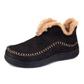 Men’s black moccasin bootie slippers with tan faux-shearling collar and stitched trim