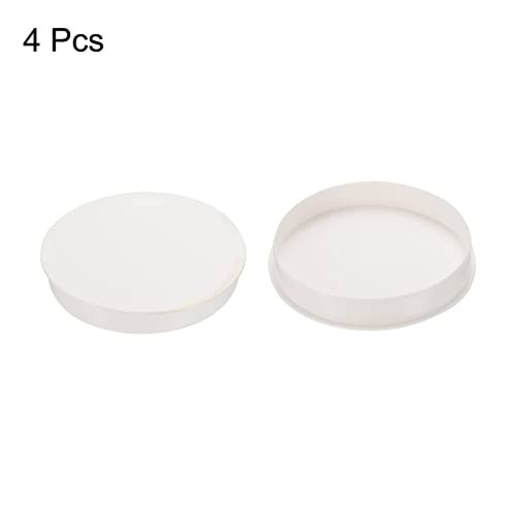 White round PVC pipe end cap plugs, two visible pieces
