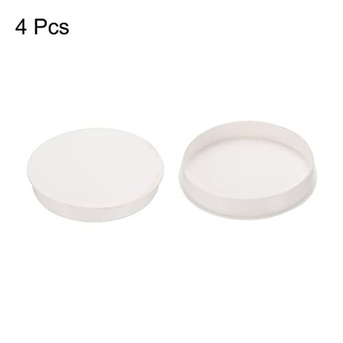 White round PVC pipe end cap plugs, two visible pieces