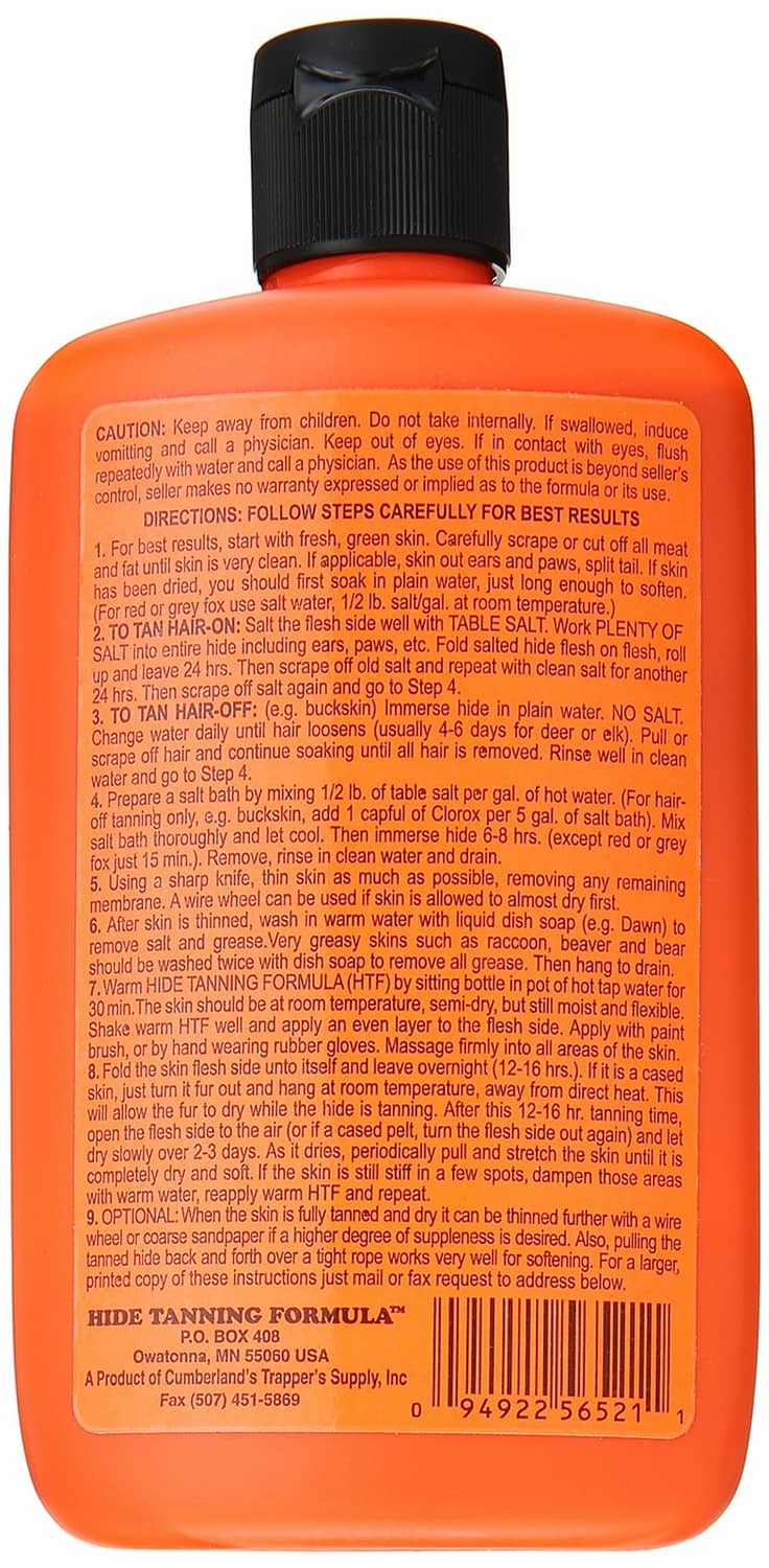 Orange hide tanning formula bottle back label with directions; black cap