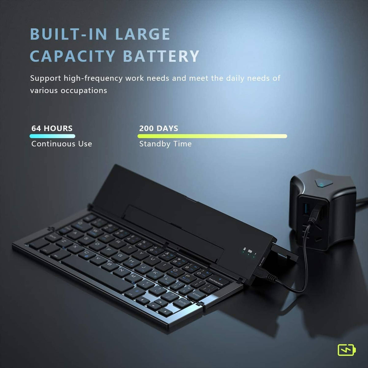 Foldable Bluetooth keyboard with indicator lights and attached charging cable, dark gray.