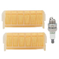 Air filter kit with two tan paper cartridges and plastic housings, plus spark plug.
