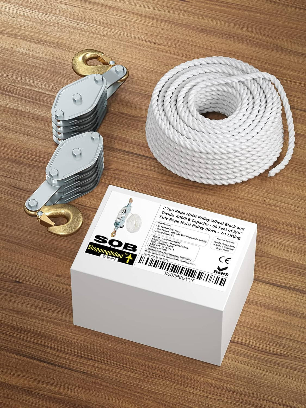 Block and tackle pulley system kit with 4 pulleys, white rope coil, and product box