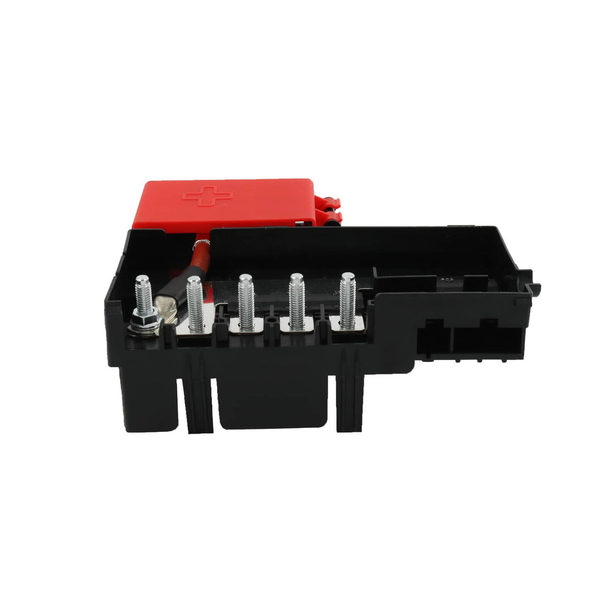 Battery fuse block angled view with red cover and multiple metal terminal studs