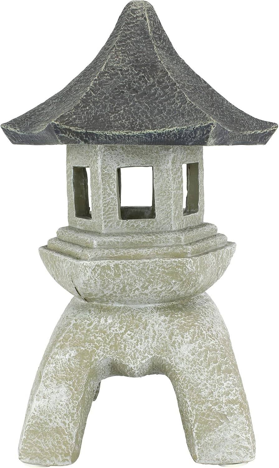 Large cast stone pagoda lantern statue with dark textured roof and rectangular window openings