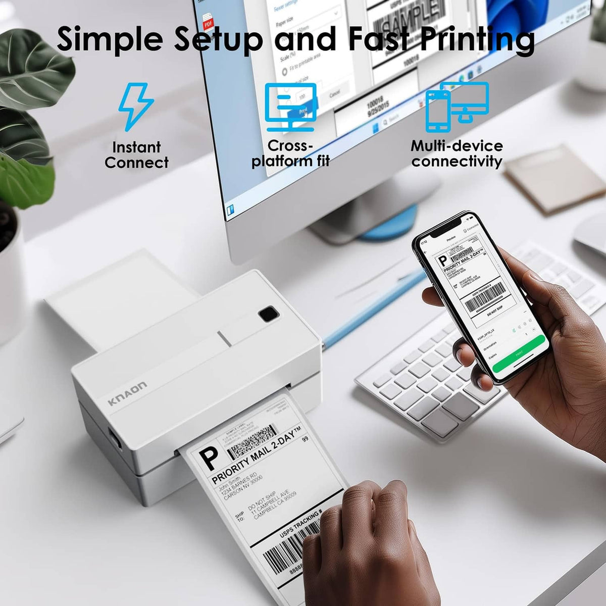 White KNAON thermal label printer and smartphone displaying a shipping label