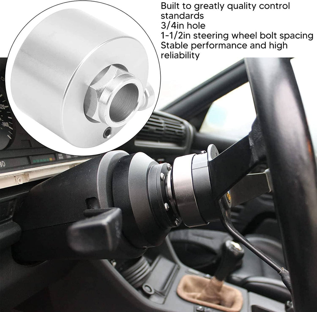 Silver quick-release steering wheel hub installed on steering column