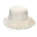 Cream cotton bucket hat with wide brim and frayed edge fringe