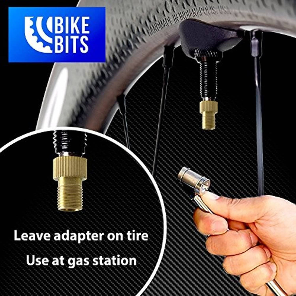 Brass Presta-to-Schrader adapter attached near a bike tire valve, hand holding hose