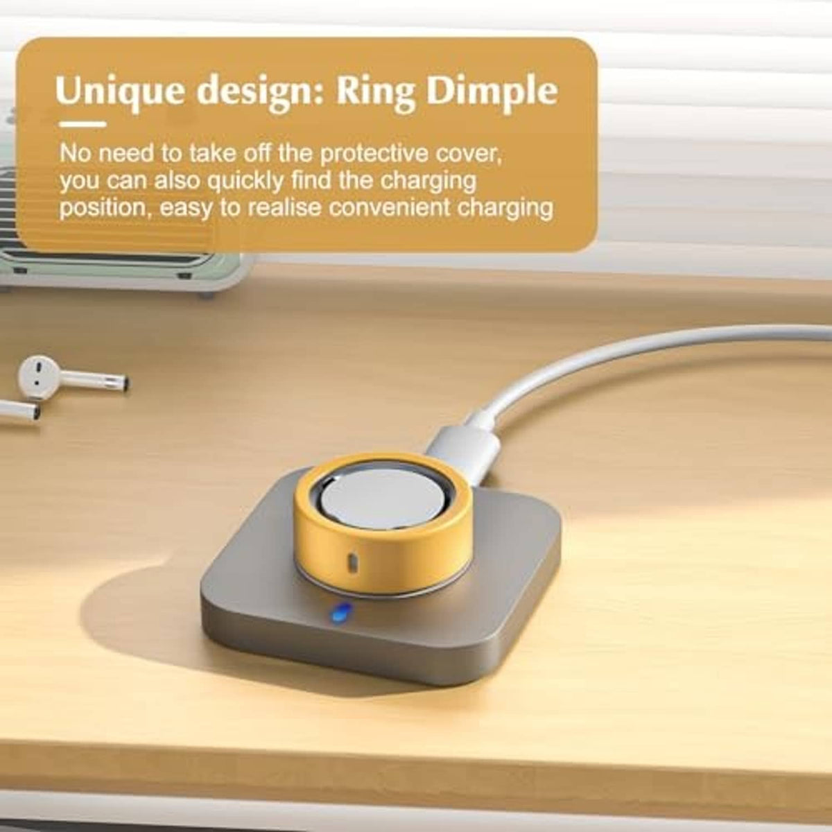 Gold smart ring protective silicone cover on charging dock with ring-position dimples