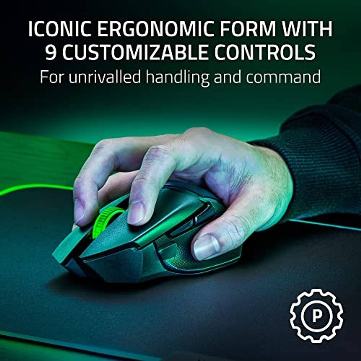 Gaming mouse with green-lit scroll, held by a hand on a desk surface