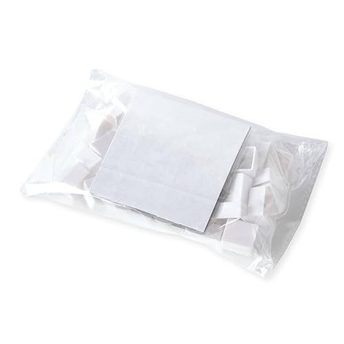 Plastic-wrapped magnetic palette sheet with empty white watercolor half pans
