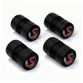 Set of four black textured wheel valve caps with red S logo inserts