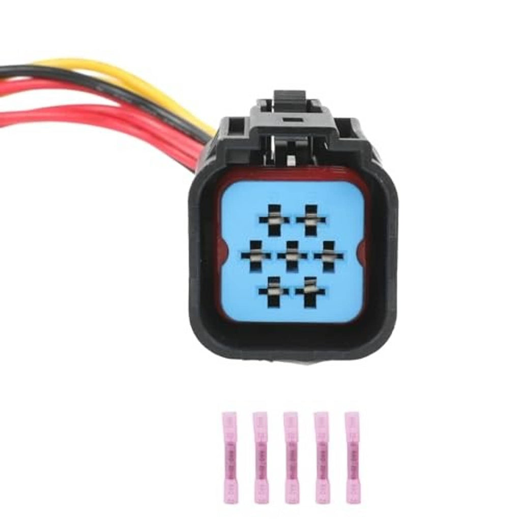 Headlight sensor connector plug close-up, blue contact insert, red and yellow wire leads