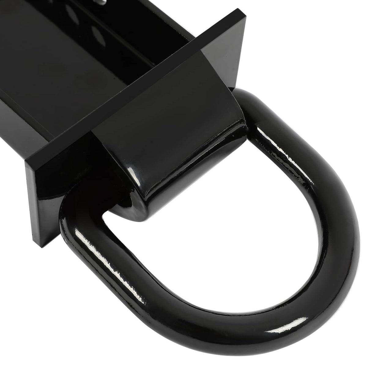 Close-up of black D-ring tied to a stake pocket bracket with curved metal base