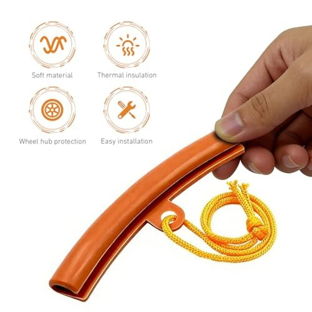 Orange wheel rim protector with yellow rope loop, hand holds the guard