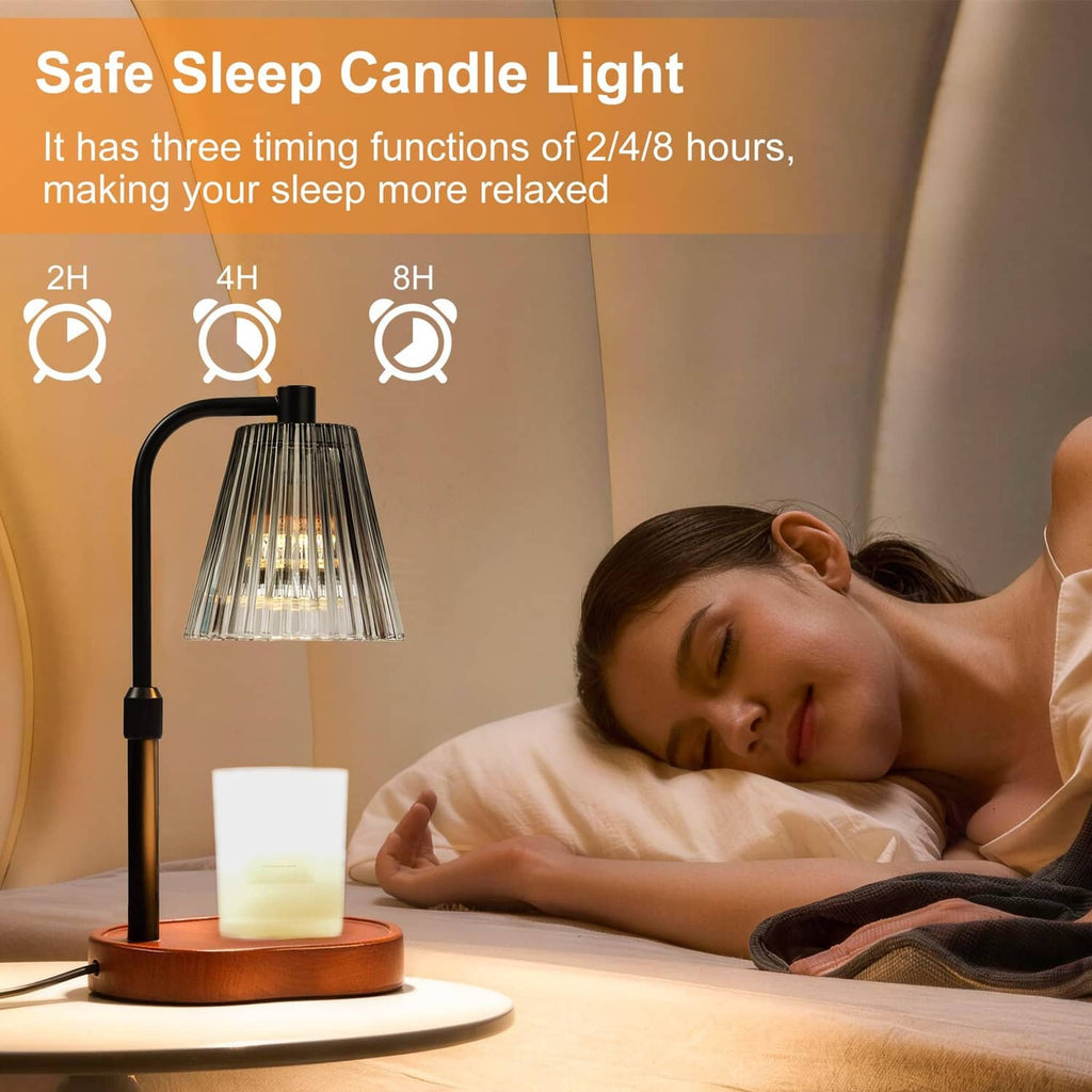 Black candle warmer lamp with glass shade and timer, warming a candle with soft glow.
