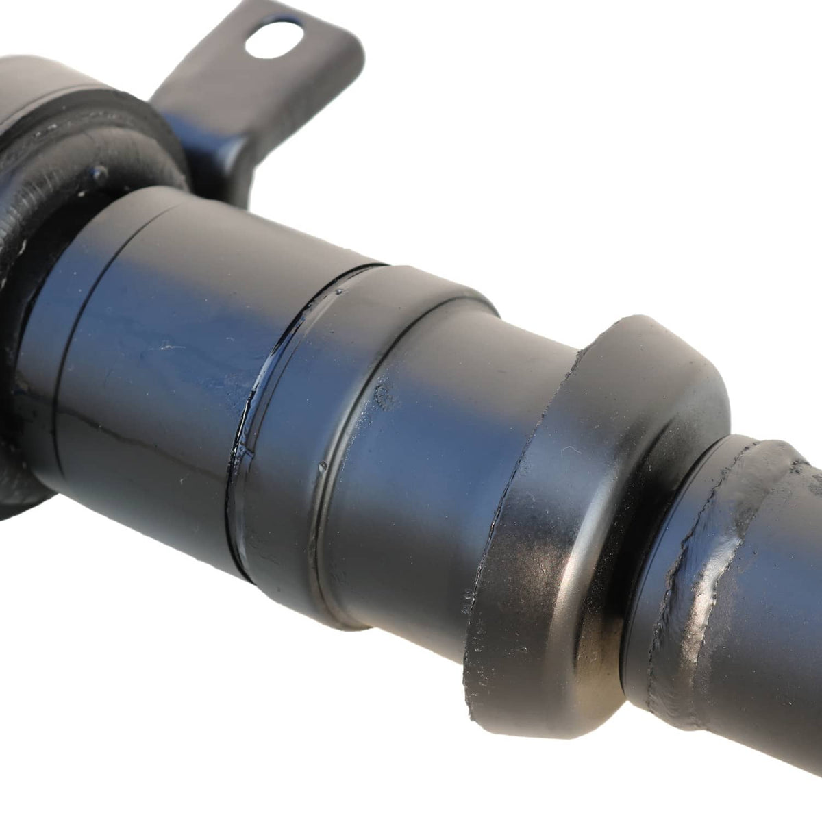 Rear driveshaft shaft section with black isolator bushing and metal band clamps