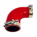 Red 90-degree silicone hose reducer with stainless steel clamp and visible rim edge