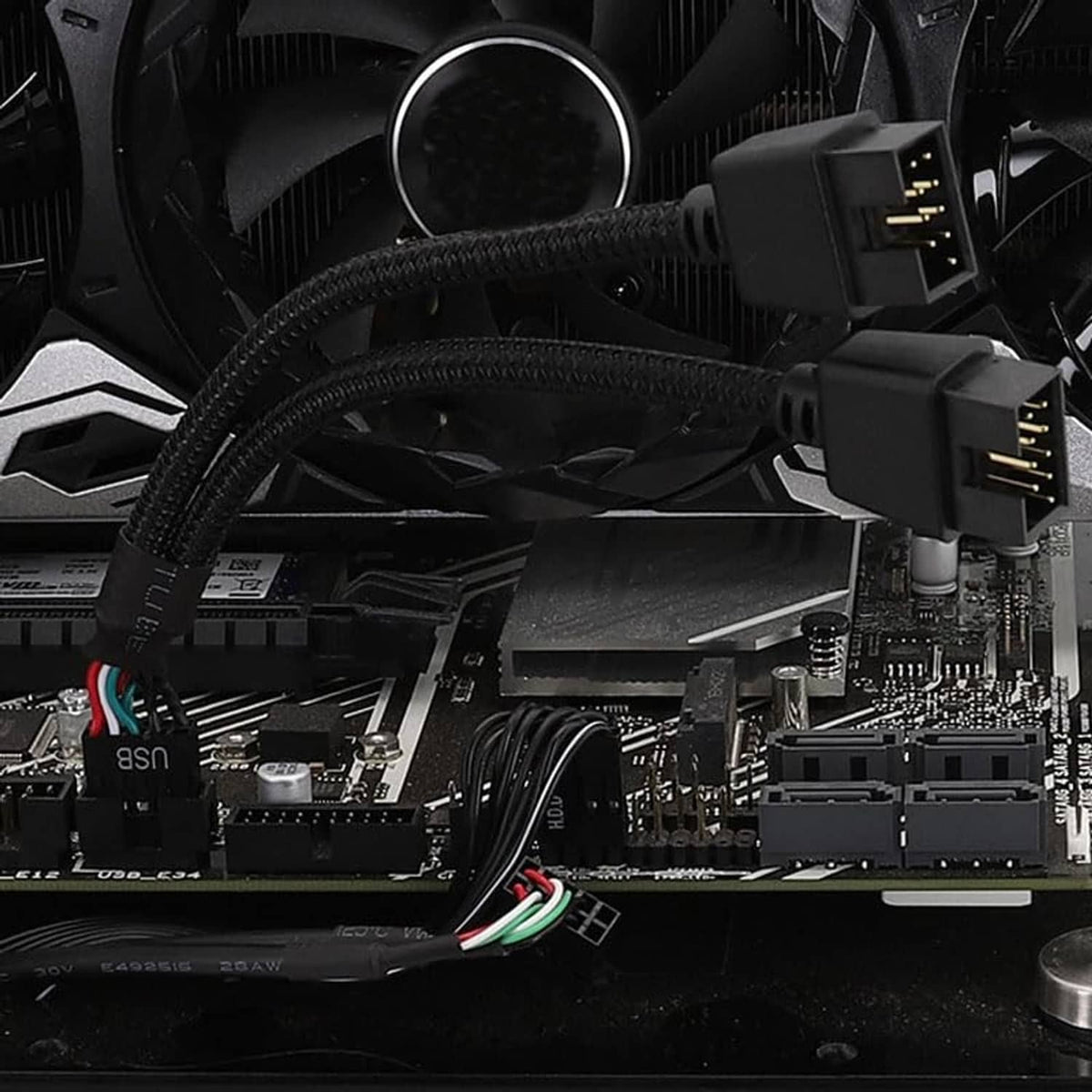 Dual 9-pin USB header splitter cables plugged into motherboard USB ports