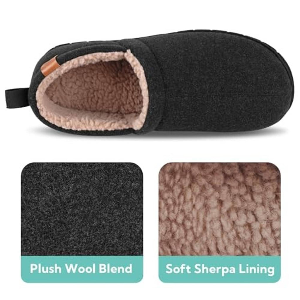 Black indoor slippers with wool-blend exterior and soft sherpa lining