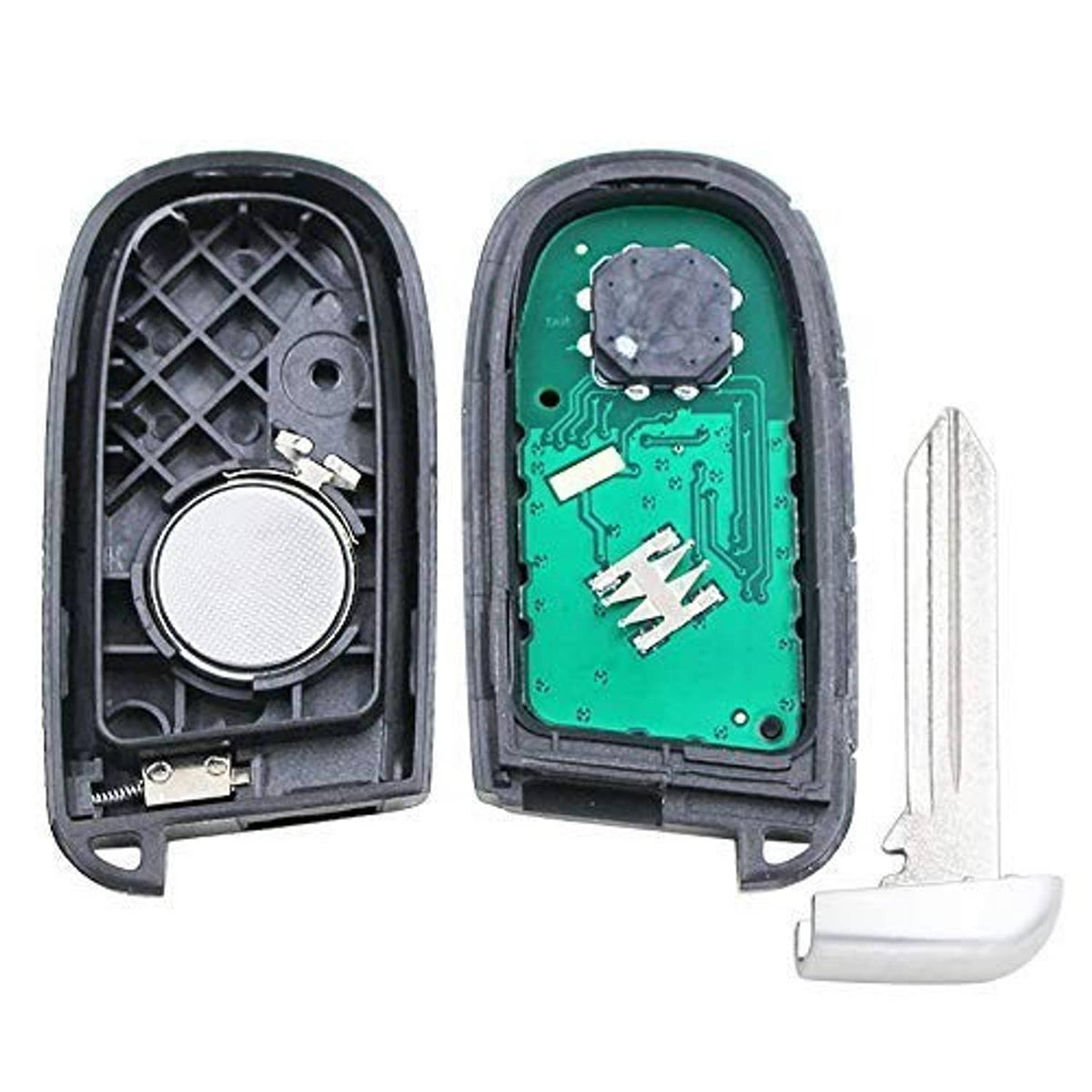 Key fob remote interior parts: dark housing, green PCB with components, and key blade.