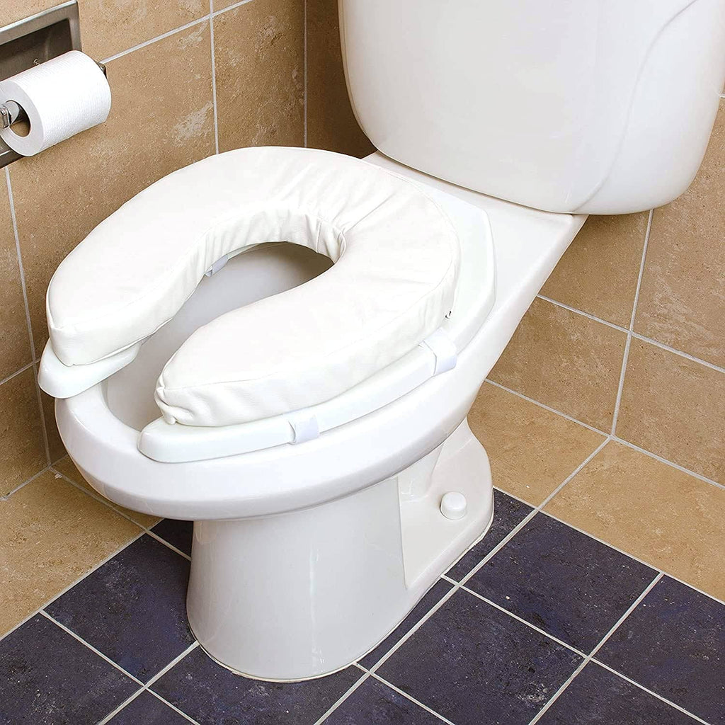 Raised toilet seat cushion with white vinyl cover and U-shaped cutout