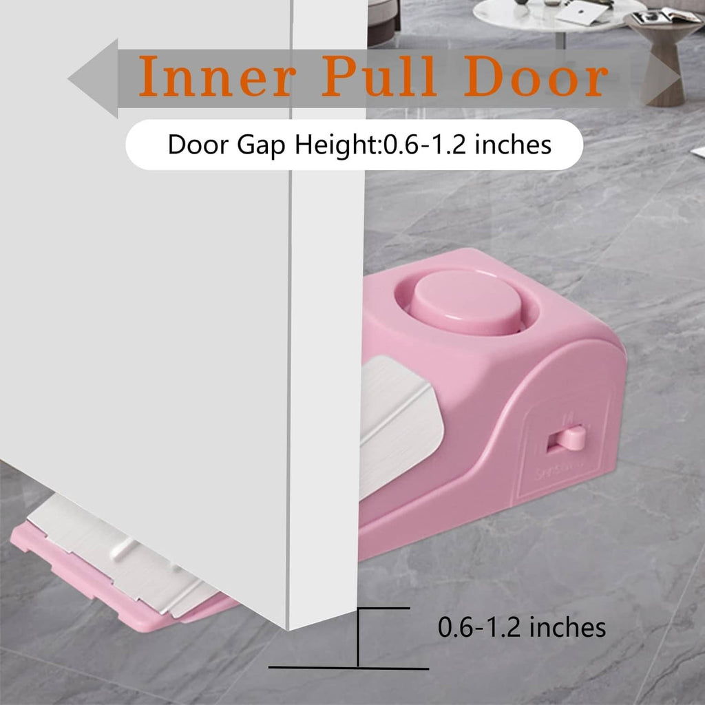 Pink portable door stop alarm wedge with top button and side indicator