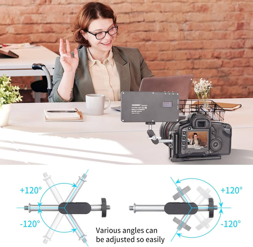 Tripod setup with mounted camera and phone holder for adjustable angles