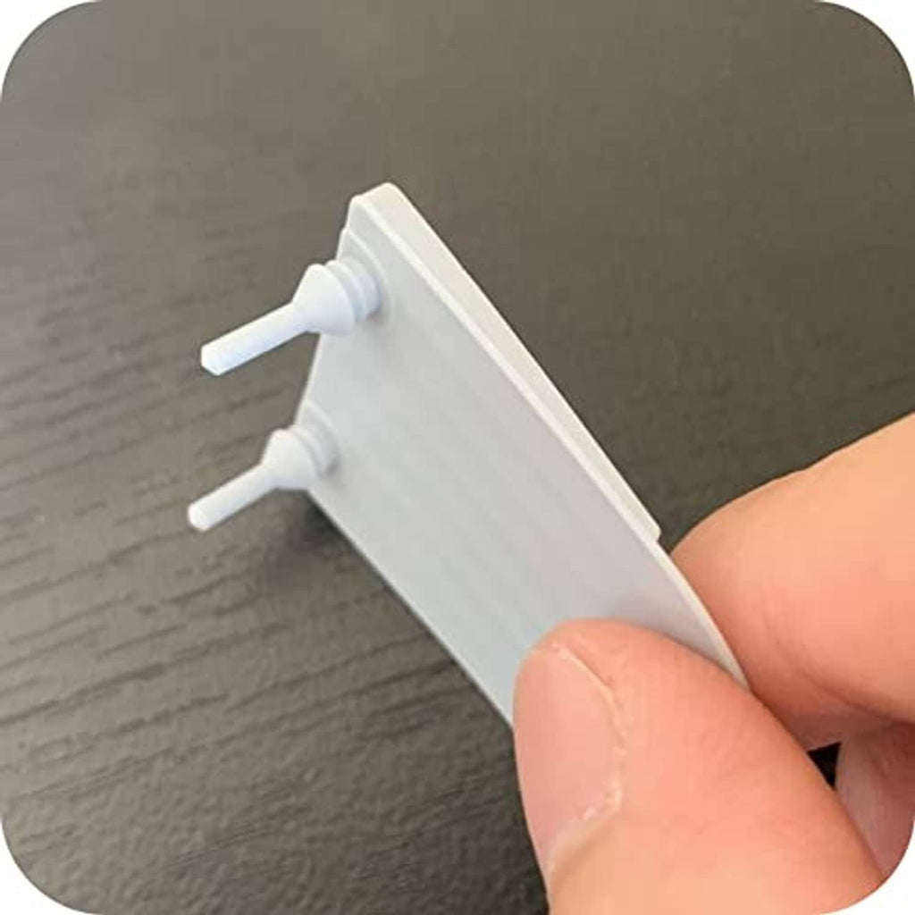 White exhalation valve replacement insert with two pegs and side stem detail