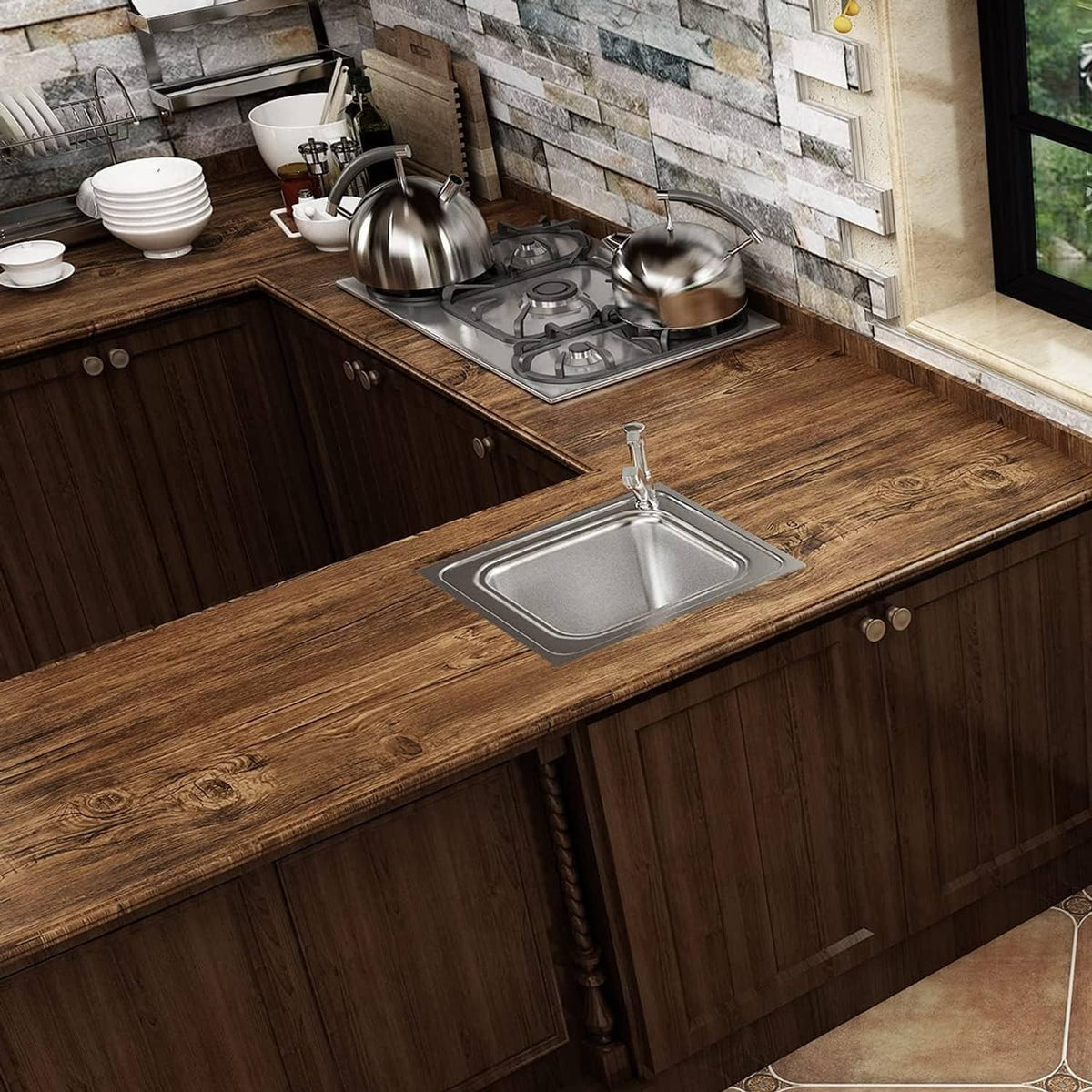 Brown faux wood contact paper covering countertop and cabinet fronts in kitchen