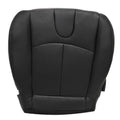 Black perforated leather seat cover with central curved seam panel