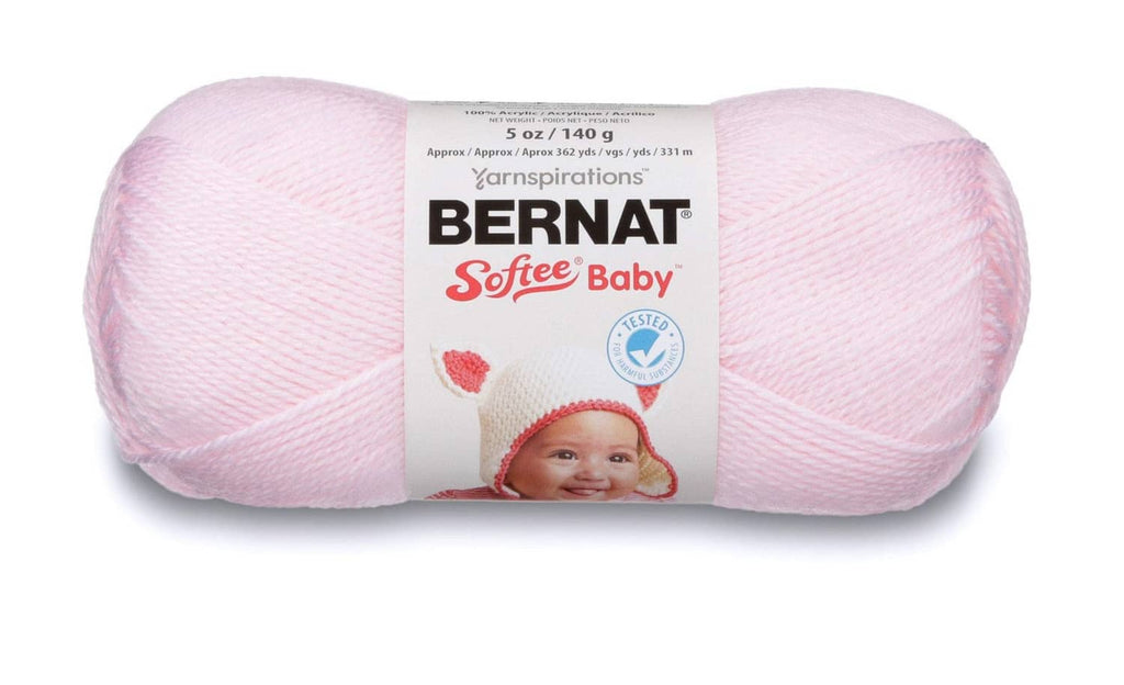 Light pink Bernat Softee Baby yarn skein with label, Oeko-Tex certified for baby crafts.