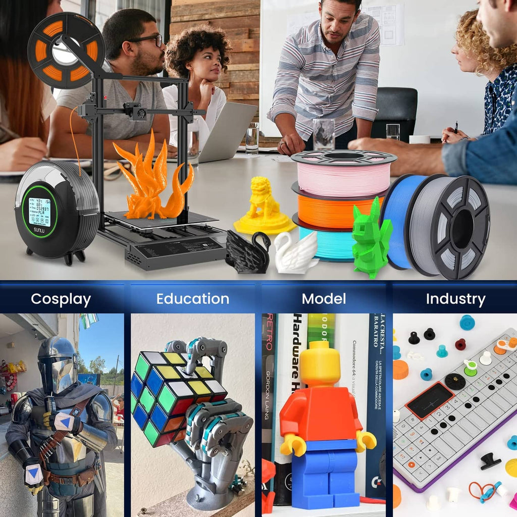 3D printer filament spools with model figurines, orange reel and green reel visible