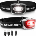 Black dual USB rechargeable headlamps with white LED lights on adjustable straps