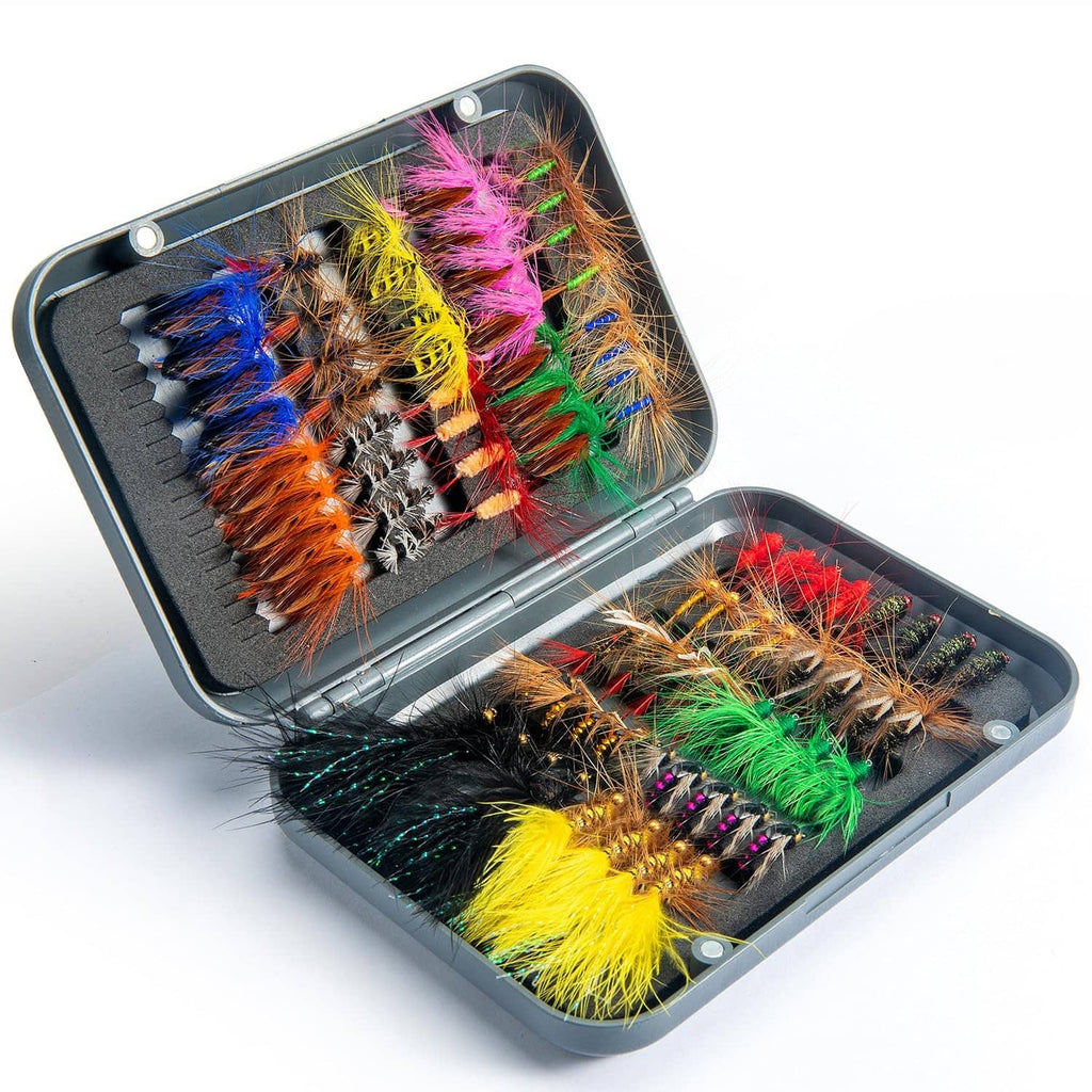 Assorted colorful fishing fly lures in an open magnetic fly box
