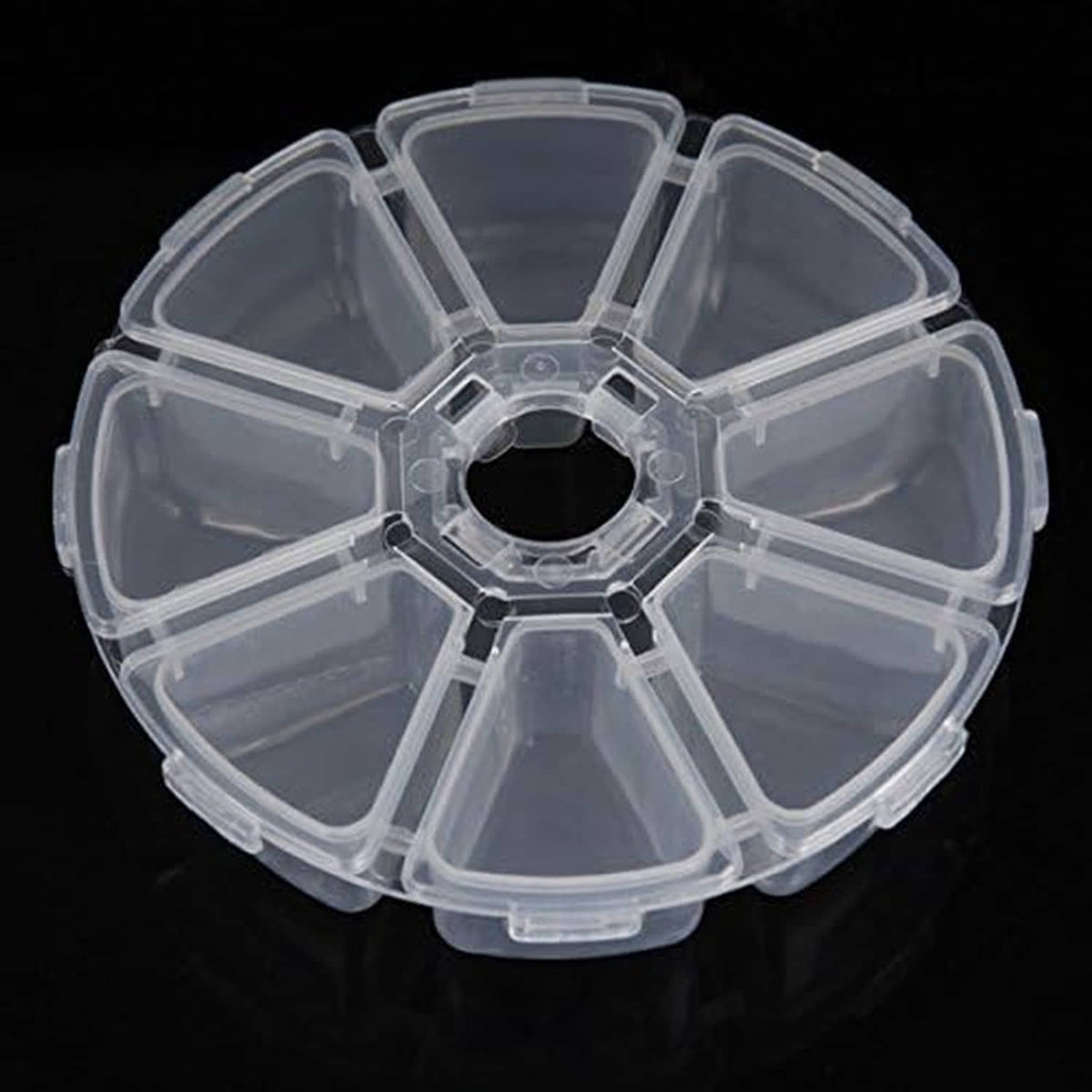 Clear round plastic bead storage case with 8 compartments and center spindle