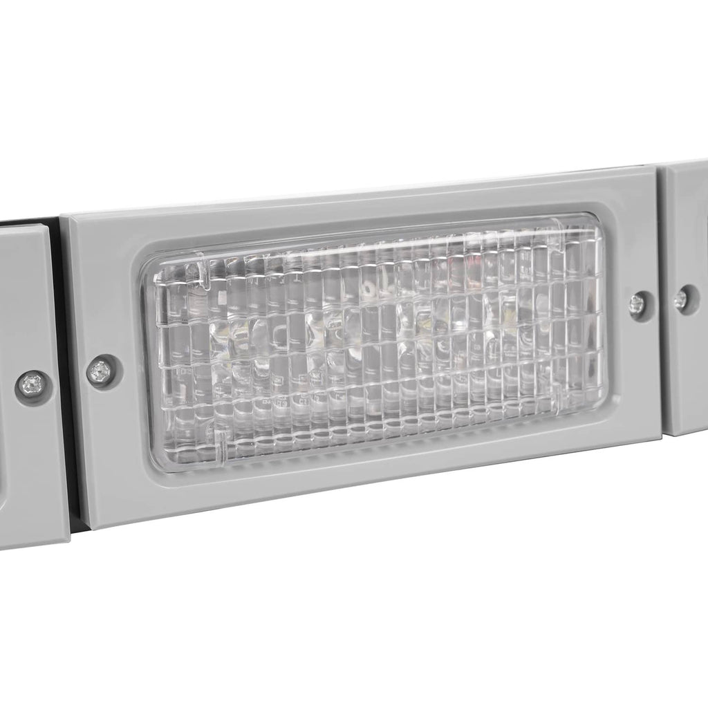 Close-up of a single rectangular LED headlight lens in a gray housing