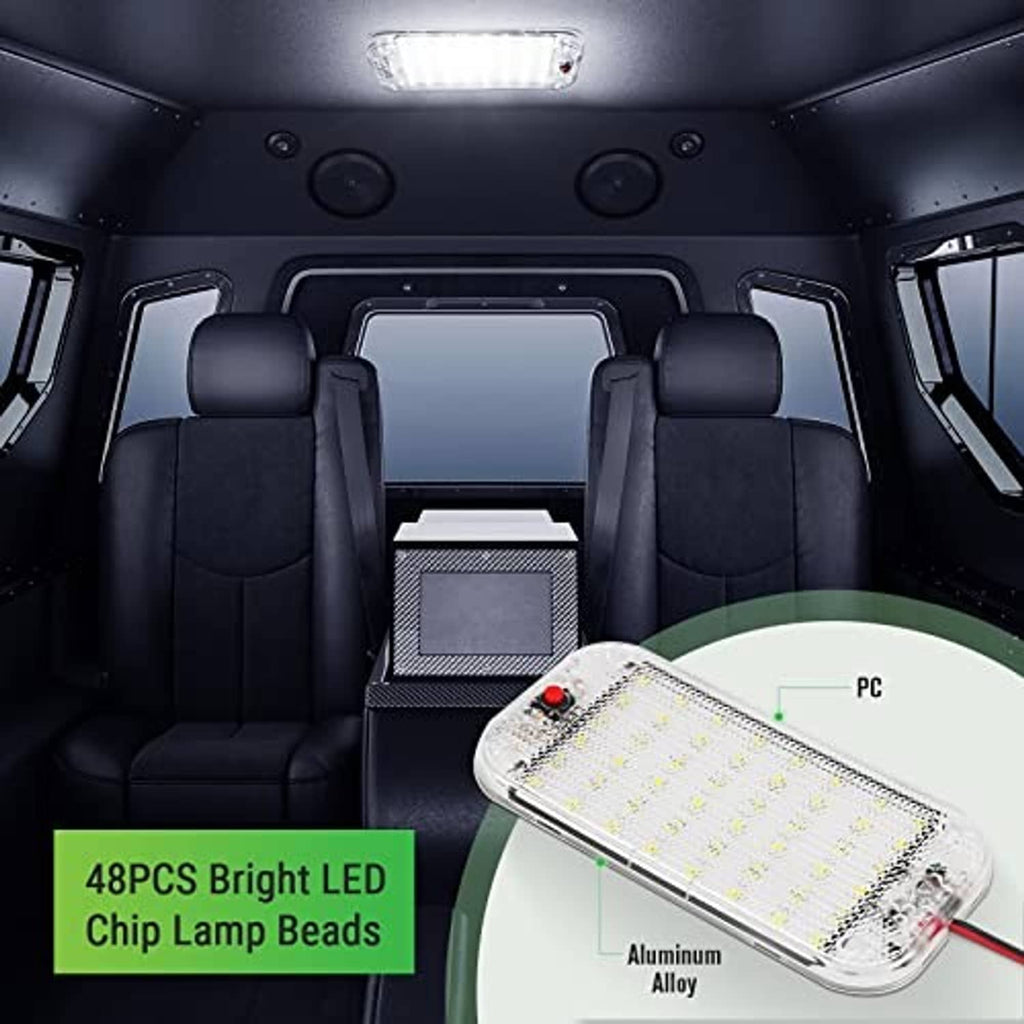 LED dome light installed inside RV, with clear lens glowing over seating area