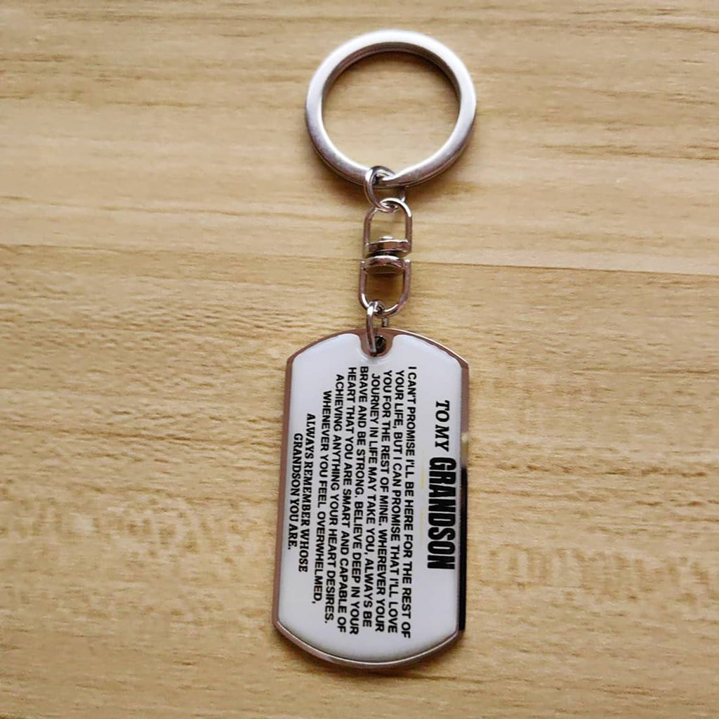 Silver dog-tag keychain on a round keyring, engraved inspirational text