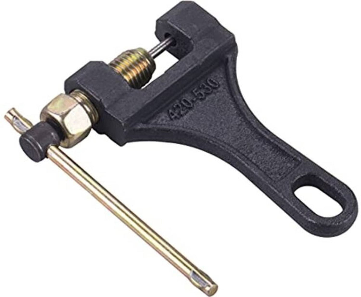 Black chain breaker tool with gold alignment pins and threaded bolt, side view