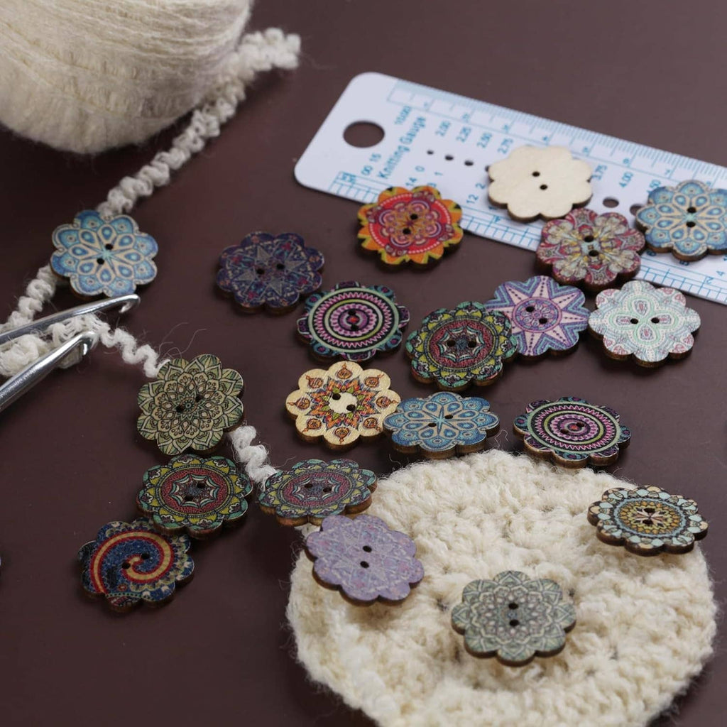 Two-hole wooden flower buttons, mixed colors, laid out beside a fabric measuring ruler