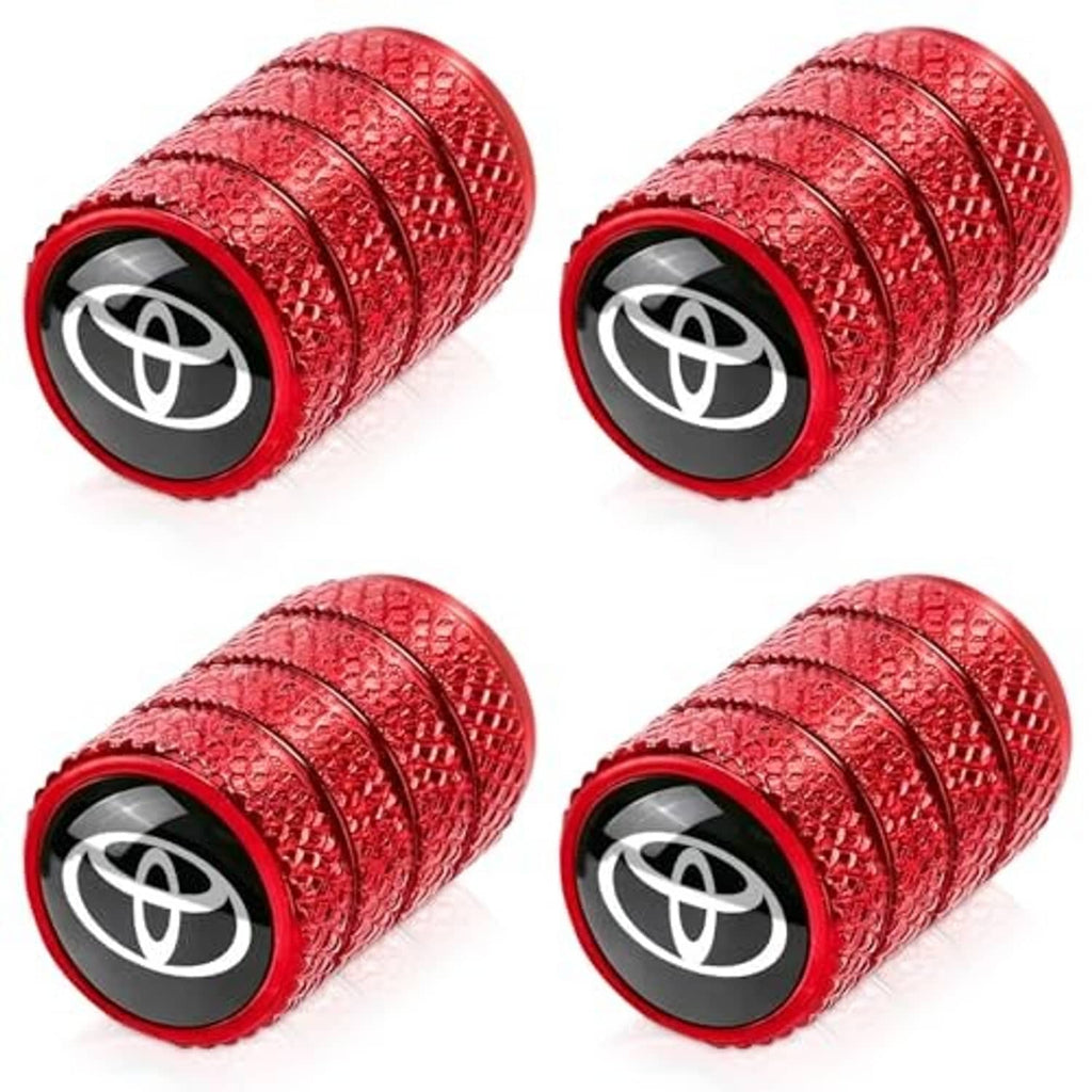 Set of four red tire valve stem caps with Toyota logo, textured grip and black base