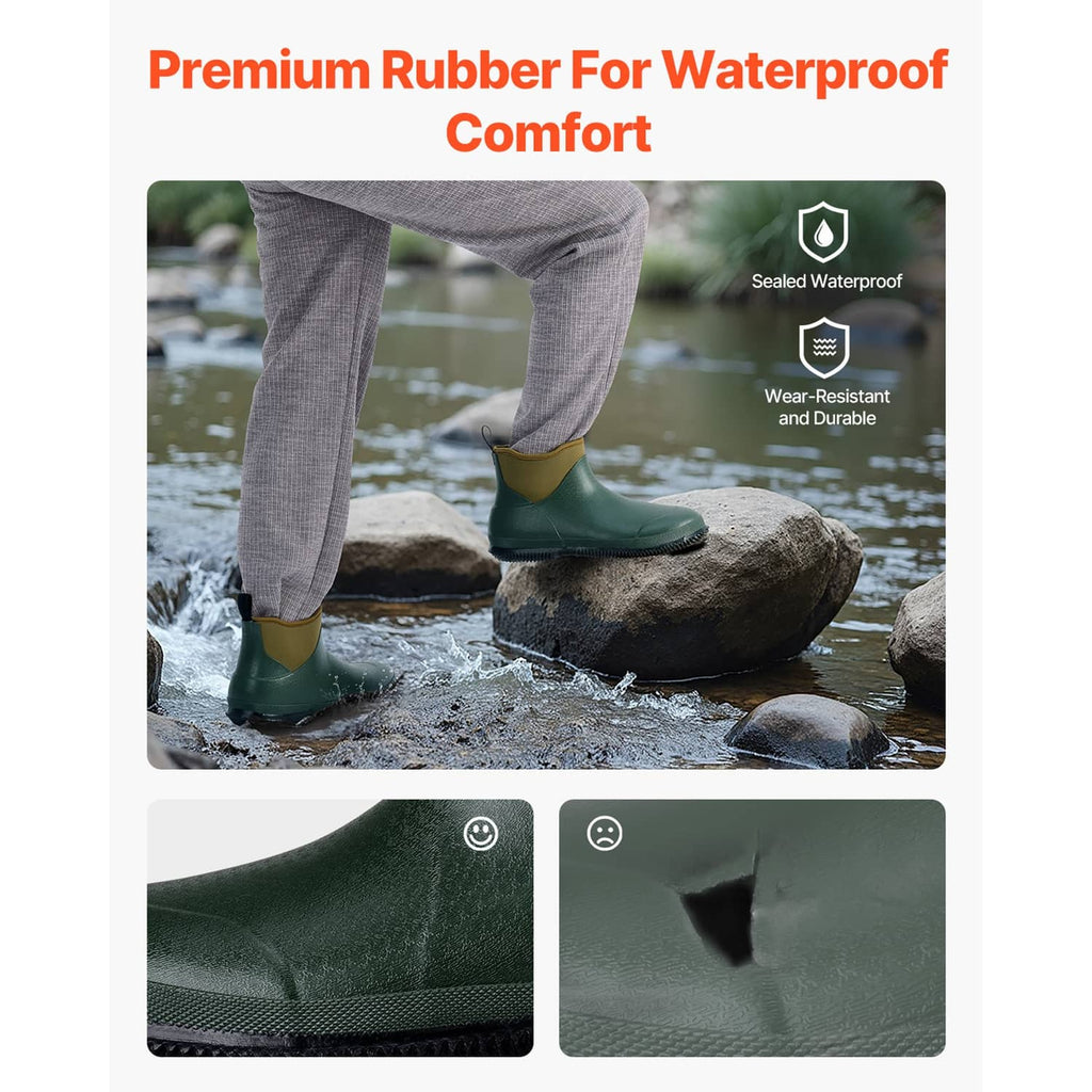 Waterproof dark green deck boots with textured tread sole, standing on wet rocks