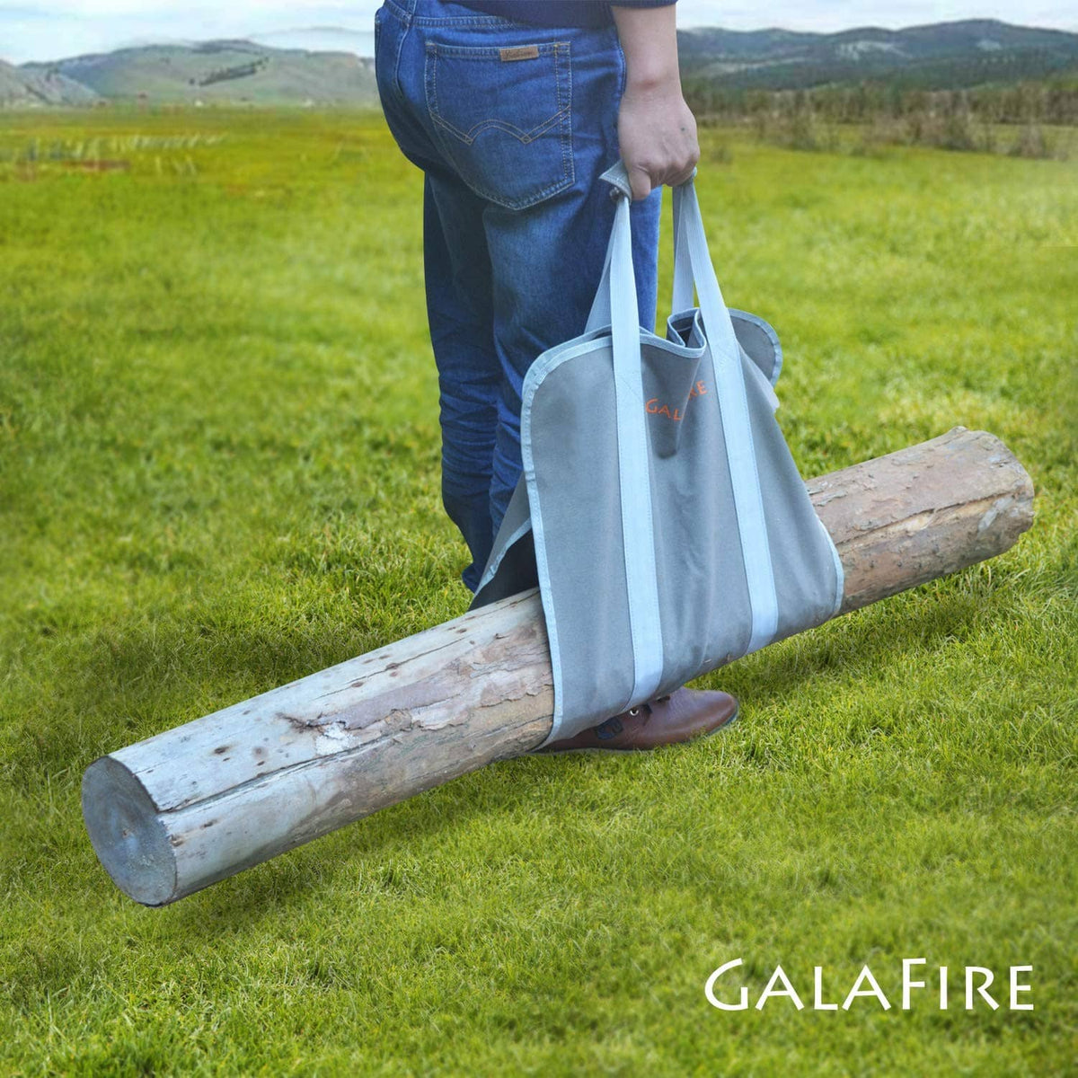 Gray canvas log carrier tote with dual light blue carrying handles