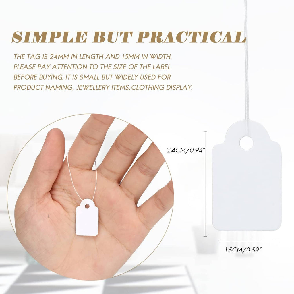 White price tags with string, including one tag shown hanging and a palm size view
