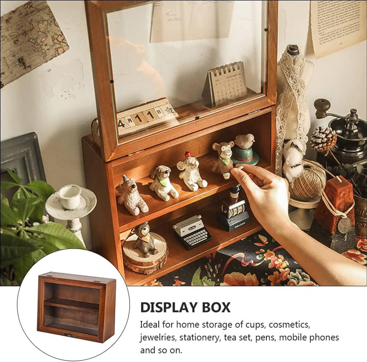 Wooden glass-front display cabinet with shelves and figurines, with hand placing items