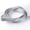 Coiled stainless steel shifter cable set with crimped end fittings, silver