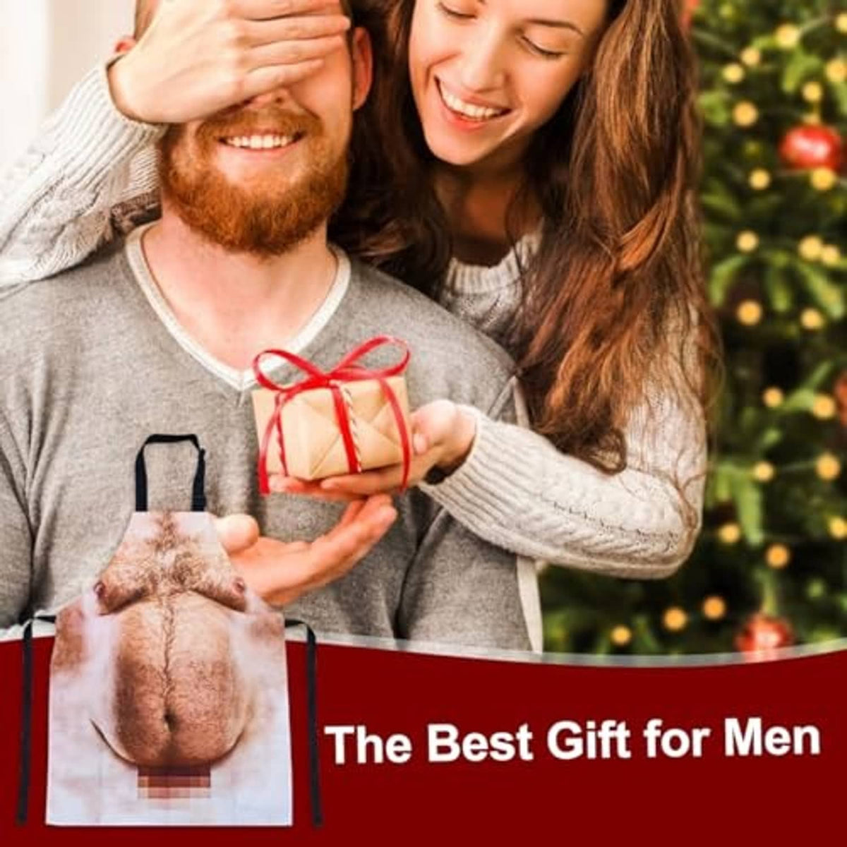 Funny novelty grilling apron with printed male torso, worn while holding a gift