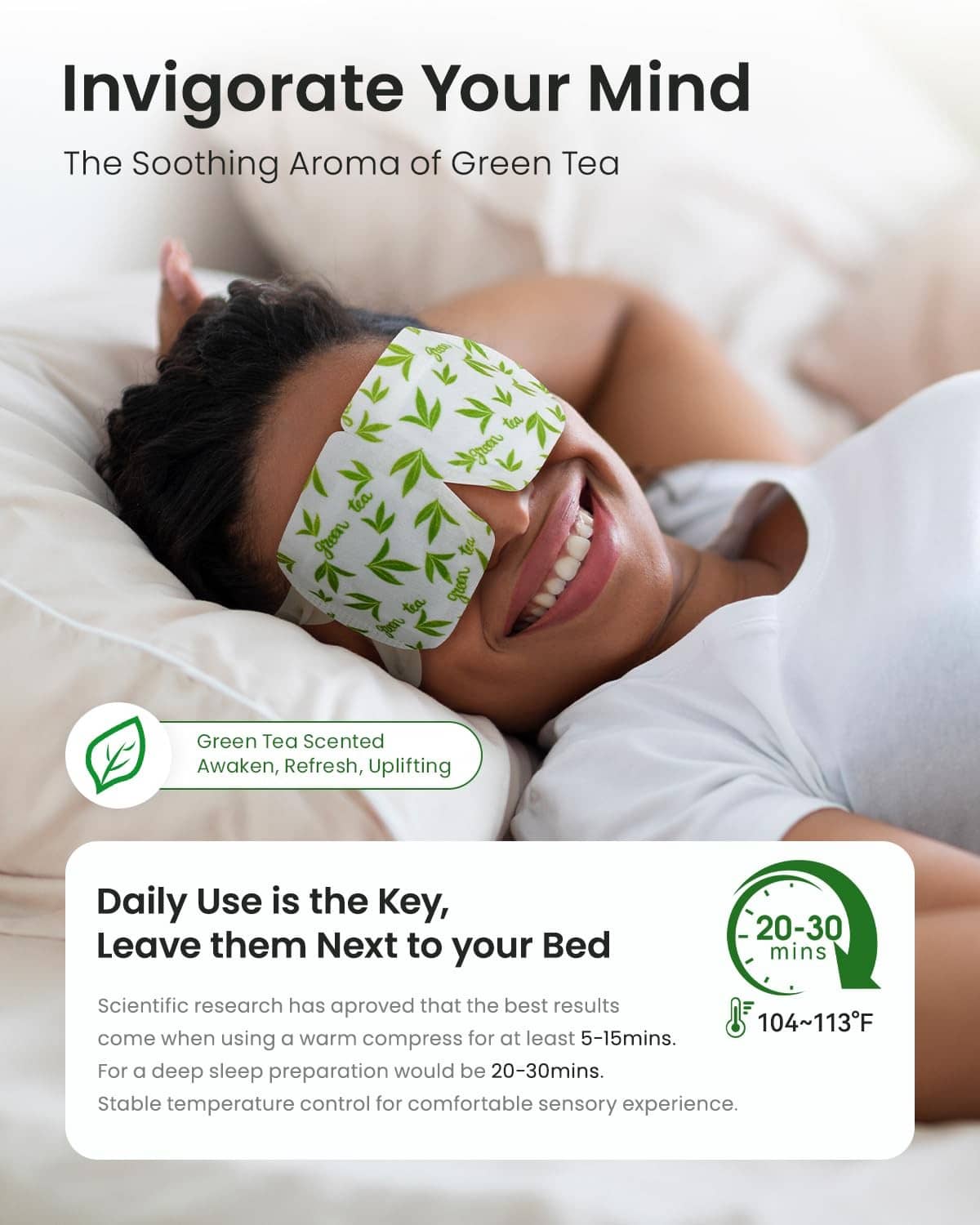 Green tea eye mask on a person in bed, white leaf-patterned warming pad